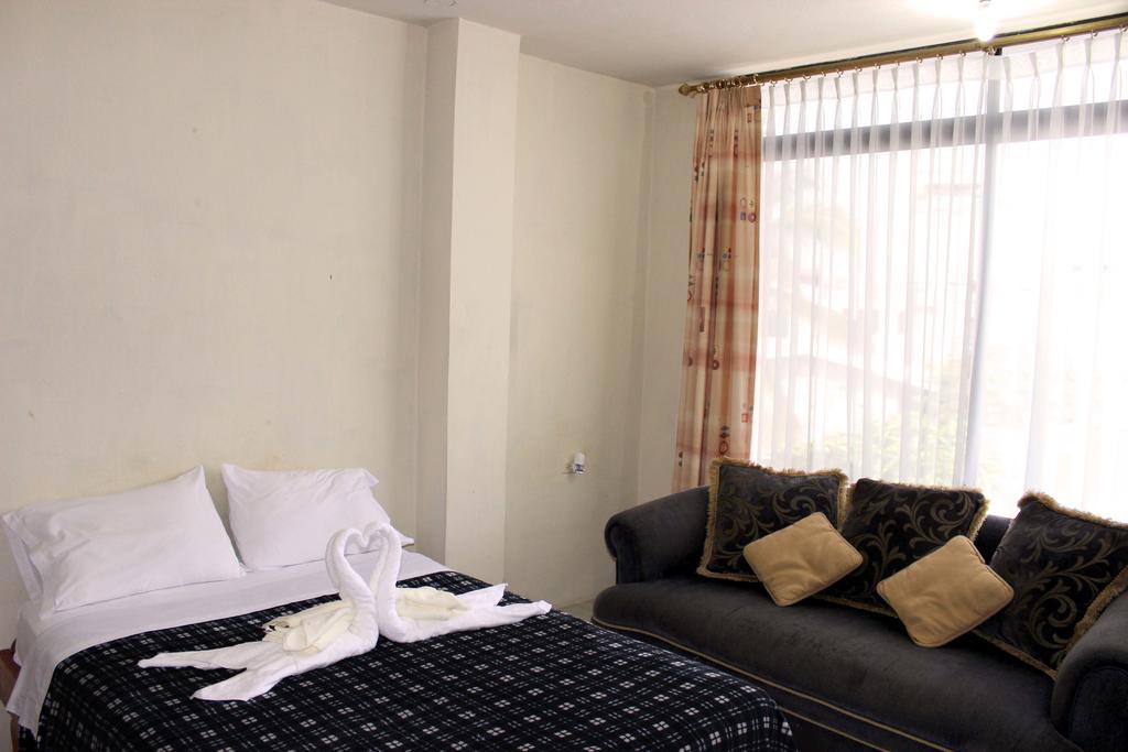 Planet House Hotell Puerto Ayora  Rum bild