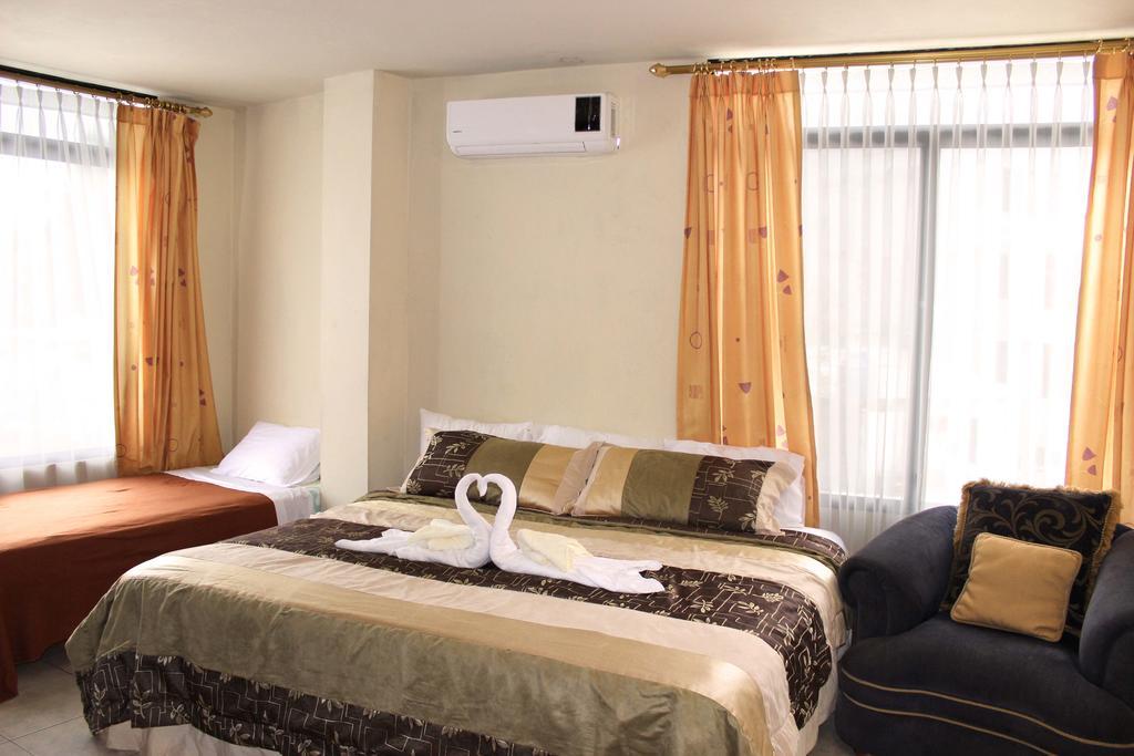 Planet House Hotell Puerto Ayora  Rum bild