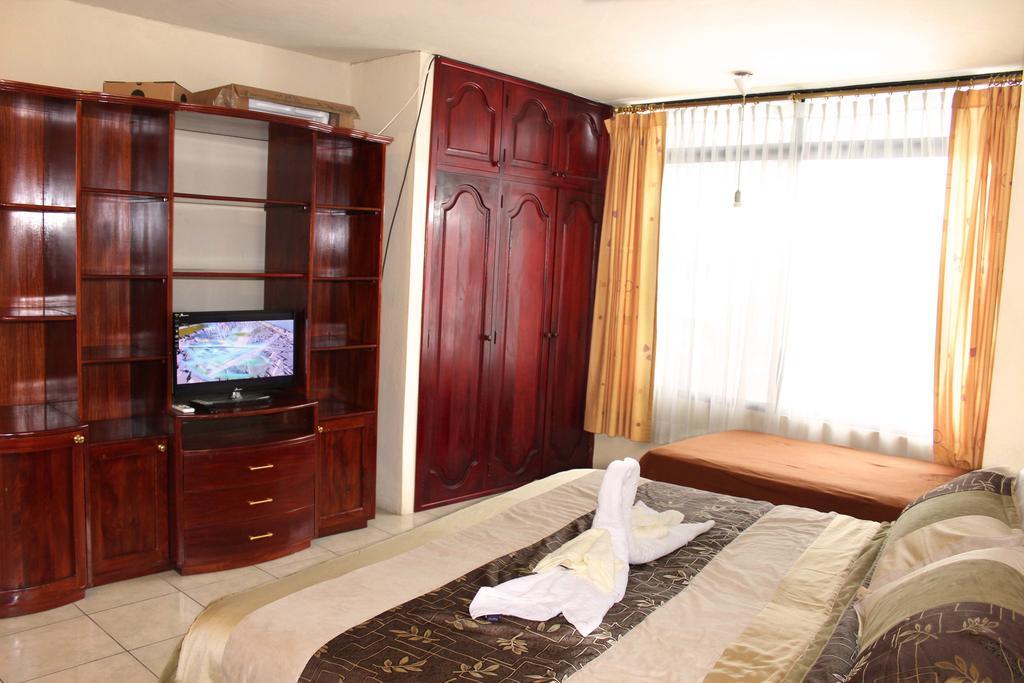 Planet House Hotell Puerto Ayora  Rum bild